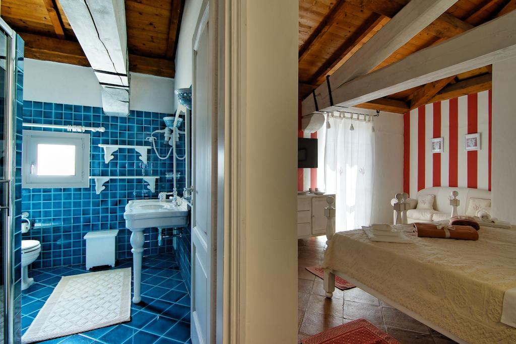 Domus Corallia-Luxury Rooms Porto Rotondo Quarto foto