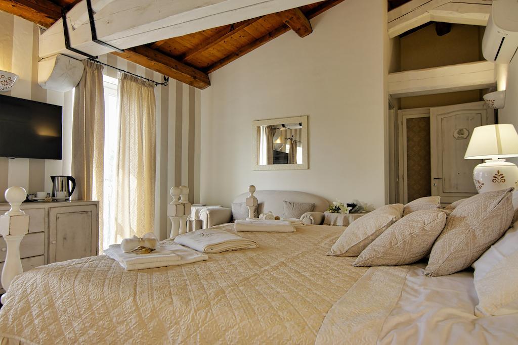 Domus Corallia-Luxury Rooms Porto Rotondo Quarto foto